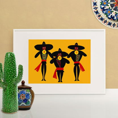 A print of three mariachi band musicians playing trumpets, the illustration is set against a dark yellow background with contrasting black outfits and vibrant red sashes in a white picture frame. White frame is on the white table and there are spinach decors on the table and the wall